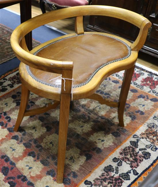 An Edwardian inlaid mahogany kidney shaped stool W.64cm